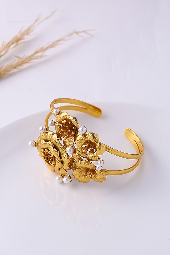 Gold Finish Cuff by Jewellery by Astha Jagwani