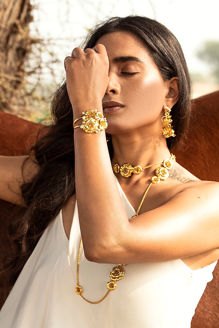 Gold Finish Cuff by Jewellery by Astha Jagwani
