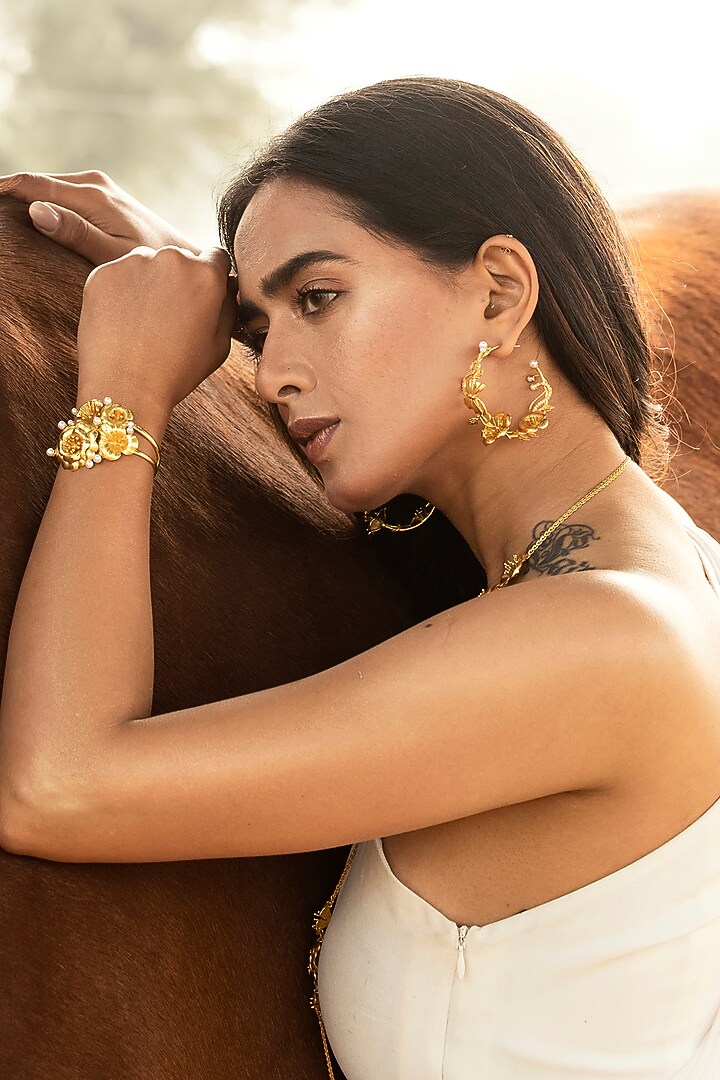Gold Finish Cuff by Jewellery by Astha Jagwani at Pernia's Pop Up Shop