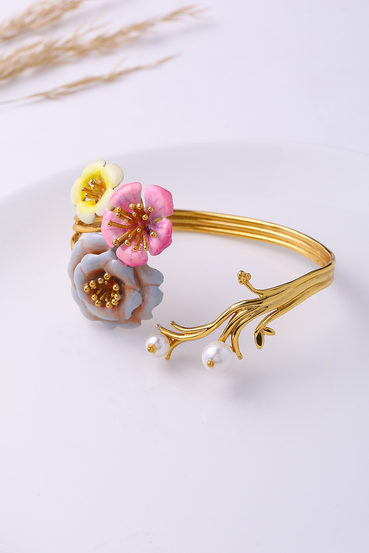 Gold Finish Grey & Yellow Enameled Periwinkle Cuff by Jewellery by Astha Jagwani