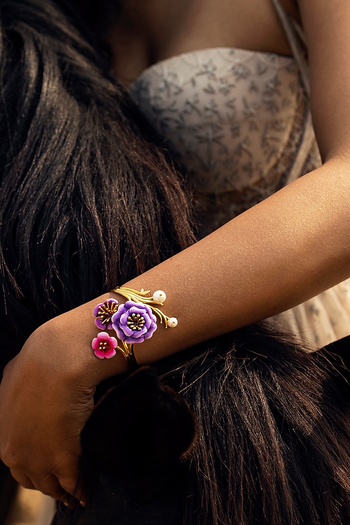 Gold Finish Purple & Pink Enameled Periwinkle Cuff by Jewellery by Astha Jagwani at Pernia's Pop Up Shop