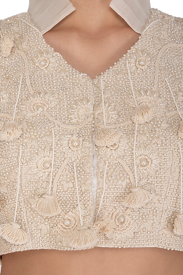 Ivory Embroidered Blouse With Wedding Lehenga Skirt by J by Jannat at Pernia's Pop Up Shop