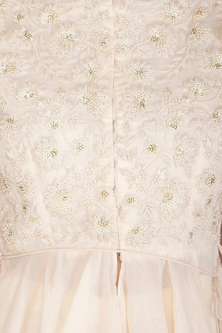 Ivory Embroidered Peplum Blouse With Wedding Sharara Pants by J by Jannat at Pernia's Pop Up Shop