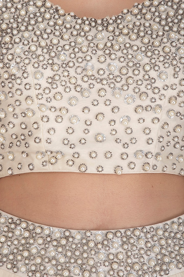 Ivory Pearl Embroidered Wedding Lehenga Set by J by Jannat at Pernia's Pop Up Shop