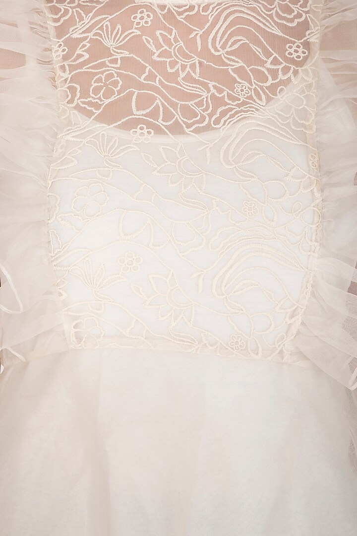 Ivory Ruffled & Embroidered Peplum Top by J by Jannat at Pernia's Pop Up Shop