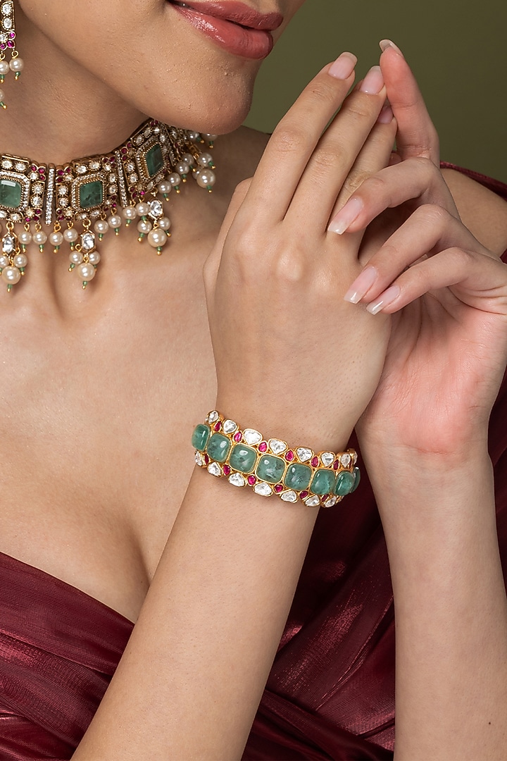 Gold Finish Red & Green Stone Bangle by Joules By Radhika at Pernia's Pop Up Shop