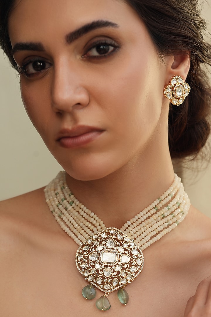 Gold Finish Kundan Polki & Cream Beaded Layered Necklace Set by Joules By Radhika at Pernia's Pop Up Shop
