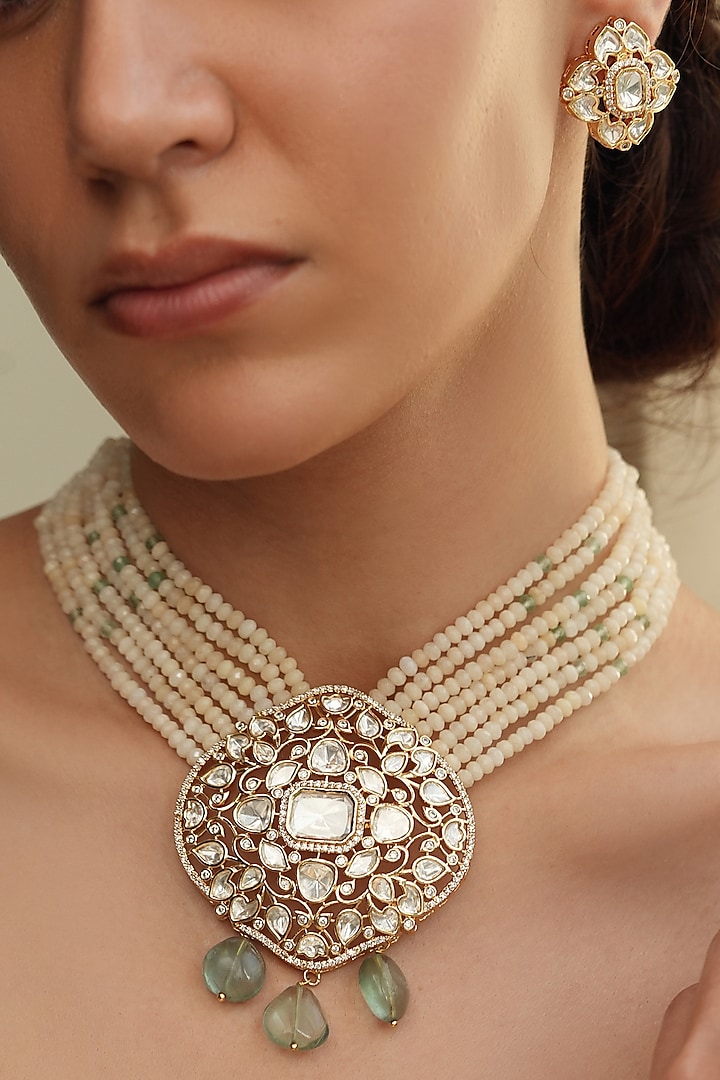 Gold Finish Kundan Polki & Cream Beaded Layered Necklace Set by Joules By Radhika at Pernia's Pop Up Shop