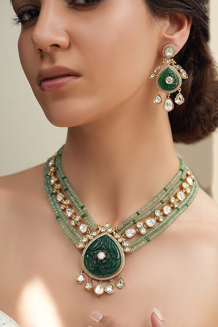 Gold Finish Kundan Polki & Green Stone Layered Necklace Set by Joules By Radhika at Pernia's Pop Up Shop