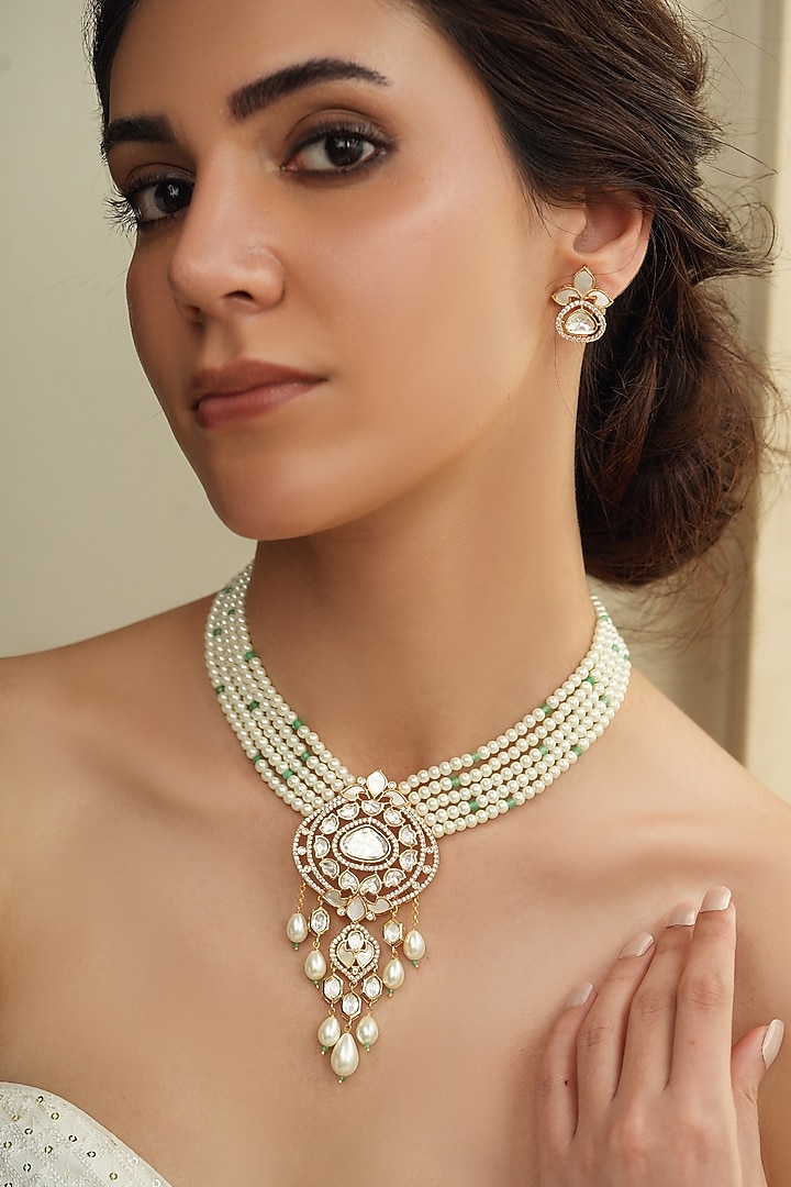 Gold Finish Kundan Polki & White Beaded Necklace Set by Joules By Radhika at Pernia's Pop Up Shop