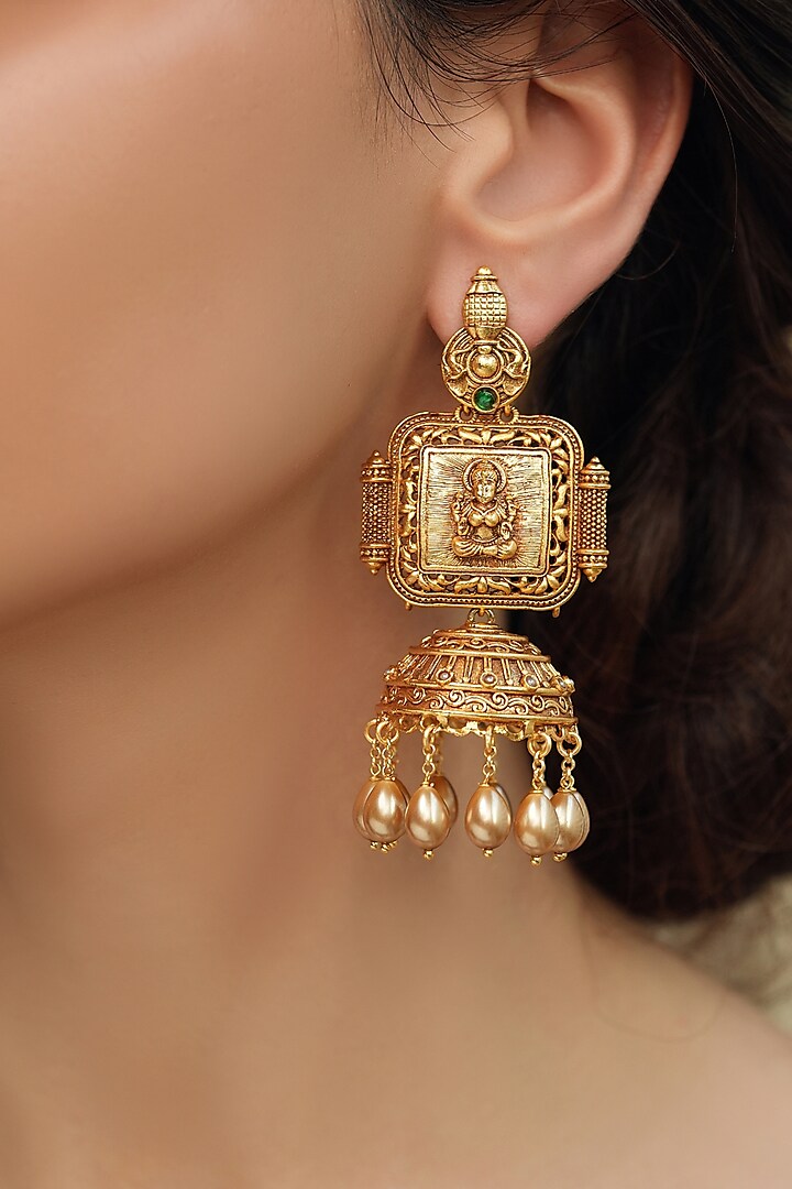Gold Finish Patterned Temple Jhumka Earrings by Joules By Radhika at Pernia's Pop Up Shop