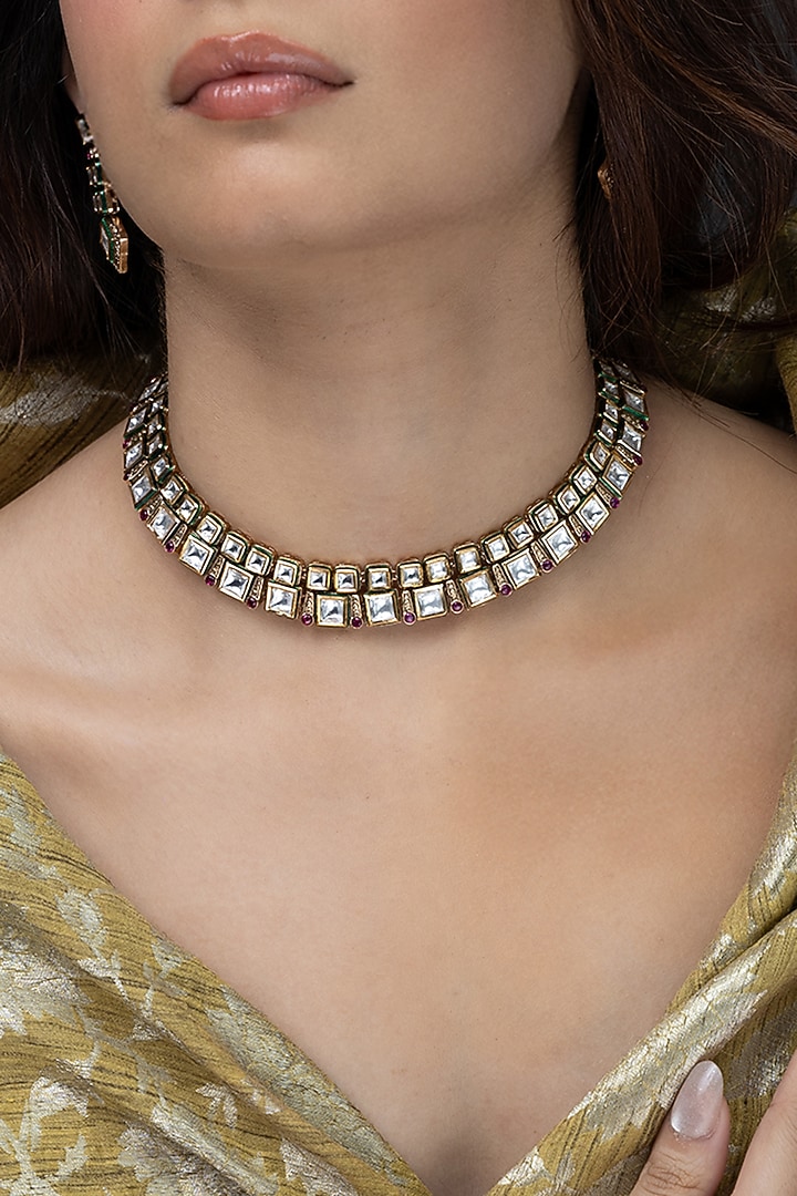 Gold Finish Emerald Stone & Crystal Necklace Set by Joules By Radhika at Pernia's Pop Up Shop