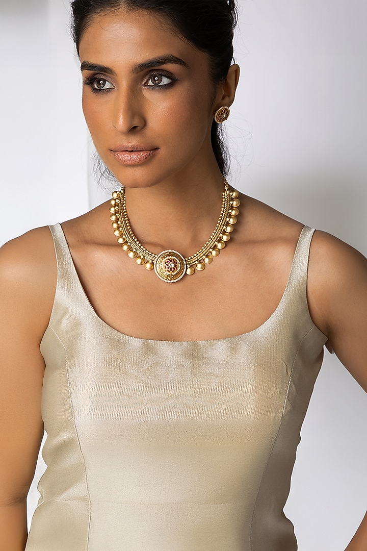 Gold Finish Red Stone & Beaded Necklace Set by Joules By Radhika at Pernia's Pop Up Shop