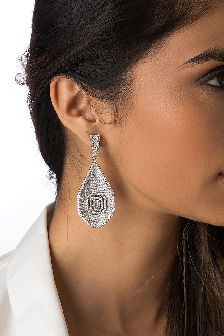 Silver Finish Textured Dangler Earrings by Joules By Radhika at Pernia's Pop Up Shop