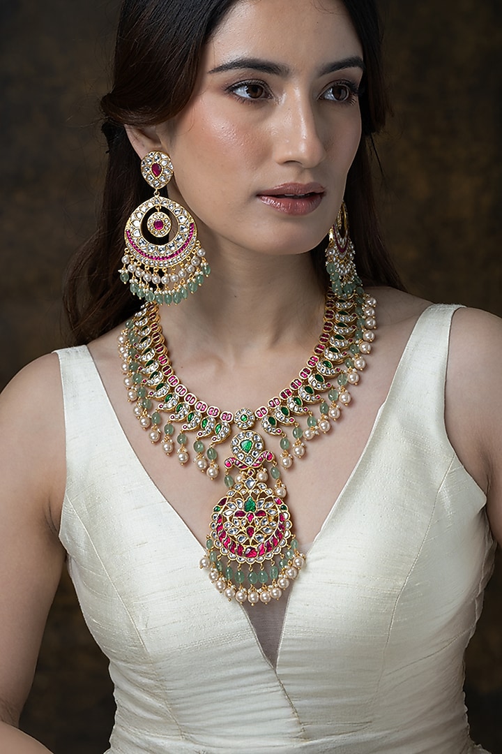 Gold Finish Peacock Feather Pendant Necklace Set by Joules By Radhika at Pernia's Pop Up Shop