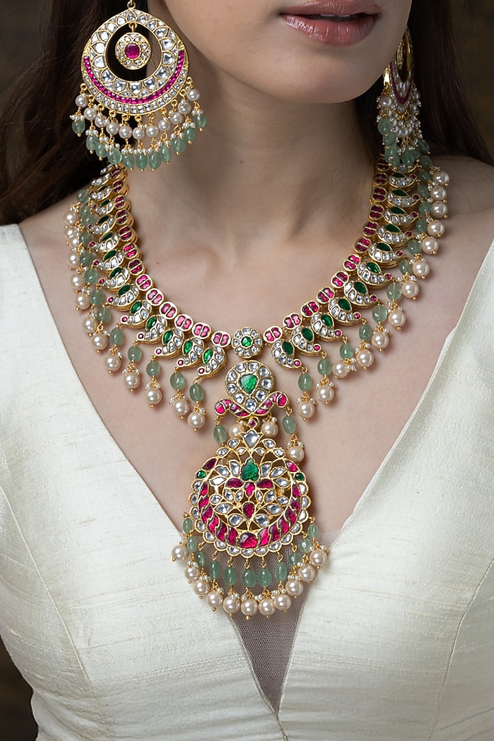 Gold Finish Peacock Feather Pendant Necklace Set by Joules By Radhika at Pernia's Pop Up Shop