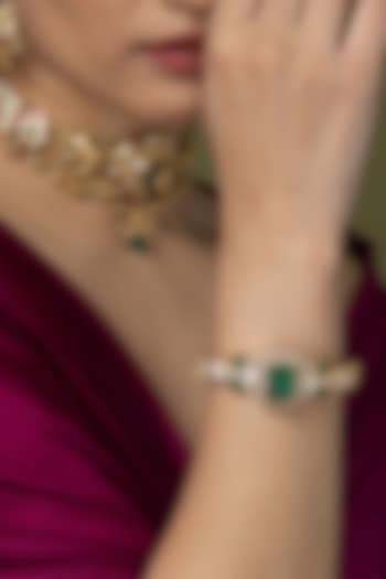 Gold Finish Emerald Green Stone Bangle by Joules By Radhika at Pernia's Pop Up Shop