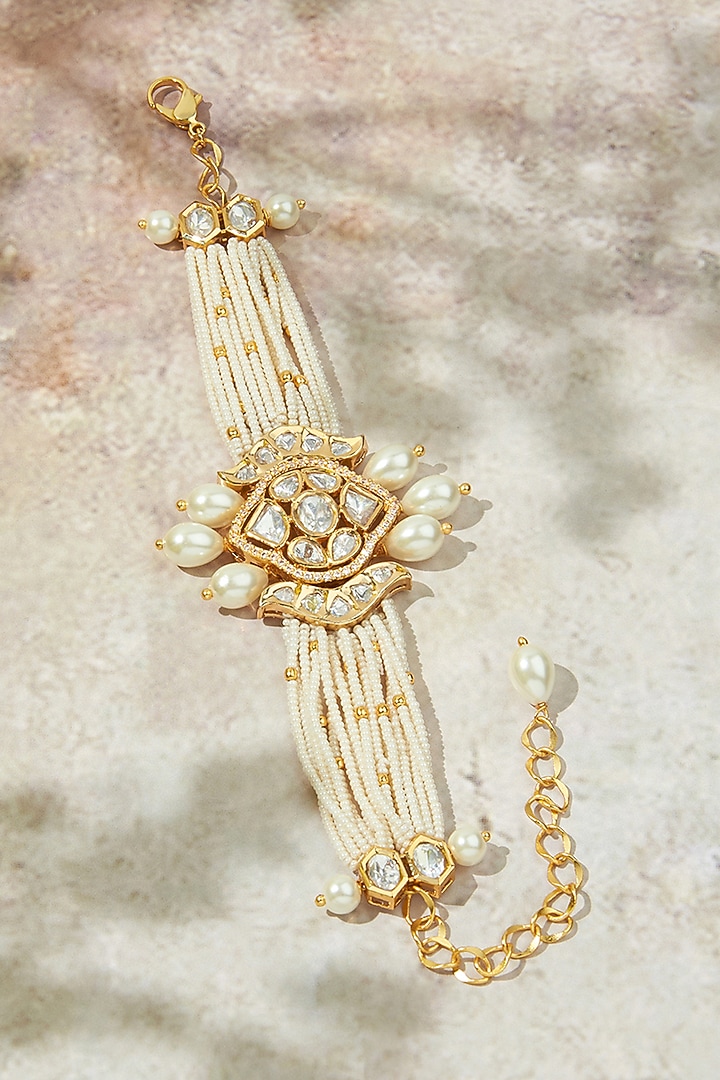 Gold Finish Kundan Polki & Pearl Beaded Bracelet by Joules By Radhika at Pernia's Pop Up Shop