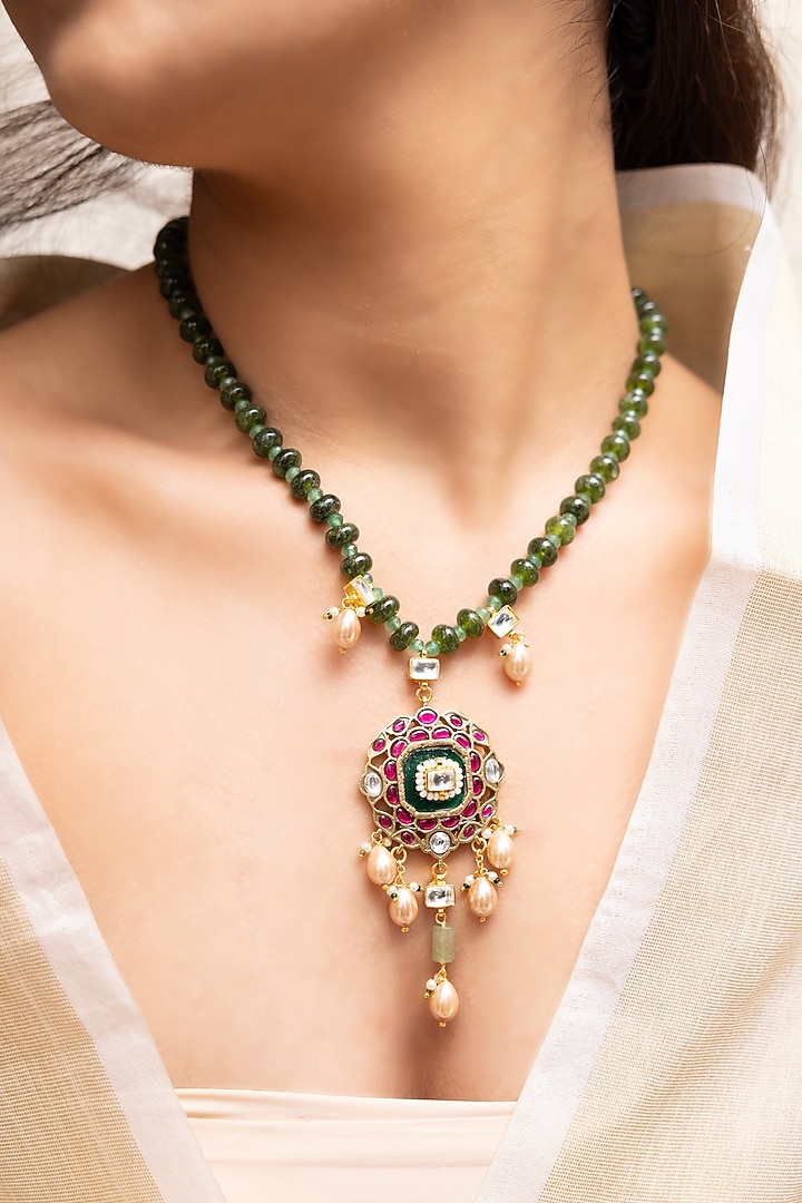 Gold Finish Kundan Polki & Green Beaded Pendant Necklace by Joules By Radhika at Pernia's Pop Up Shop