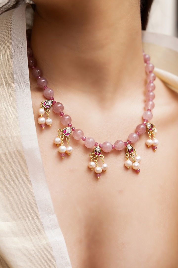 Gold Finish Floral Charm & Pearl Drop Necklace by Joules By Radhika at Pernia's Pop Up Shop