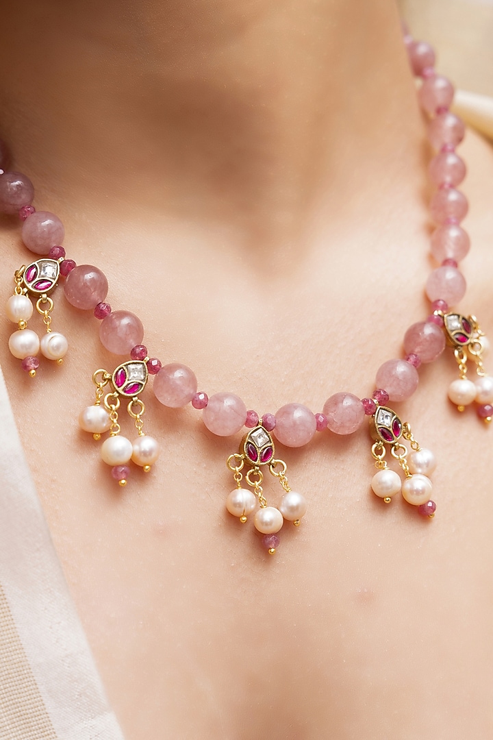 Gold Finish Floral Charm & Pearl Drop Necklace by Joules By Radhika at Pernia's Pop Up Shop