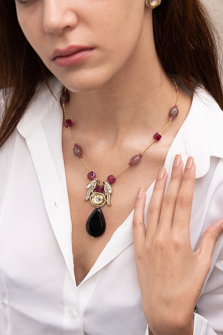 Gold Finish Plum Beaded & Tasseled Necklace by Joules By Radhika at Pernia's Pop Up Shop