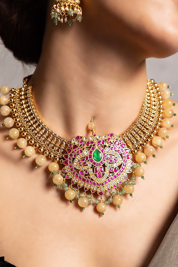 Antique Gold Finish Lotus Pendant Necklace Set by Joules By Radhika at Pernia's Pop Up Shop