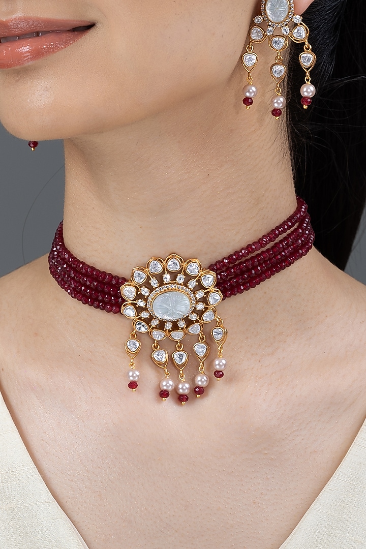 Gold Finish Red Stone Necklace Set by Joules By Radhika at Pernia's Pop Up Shop