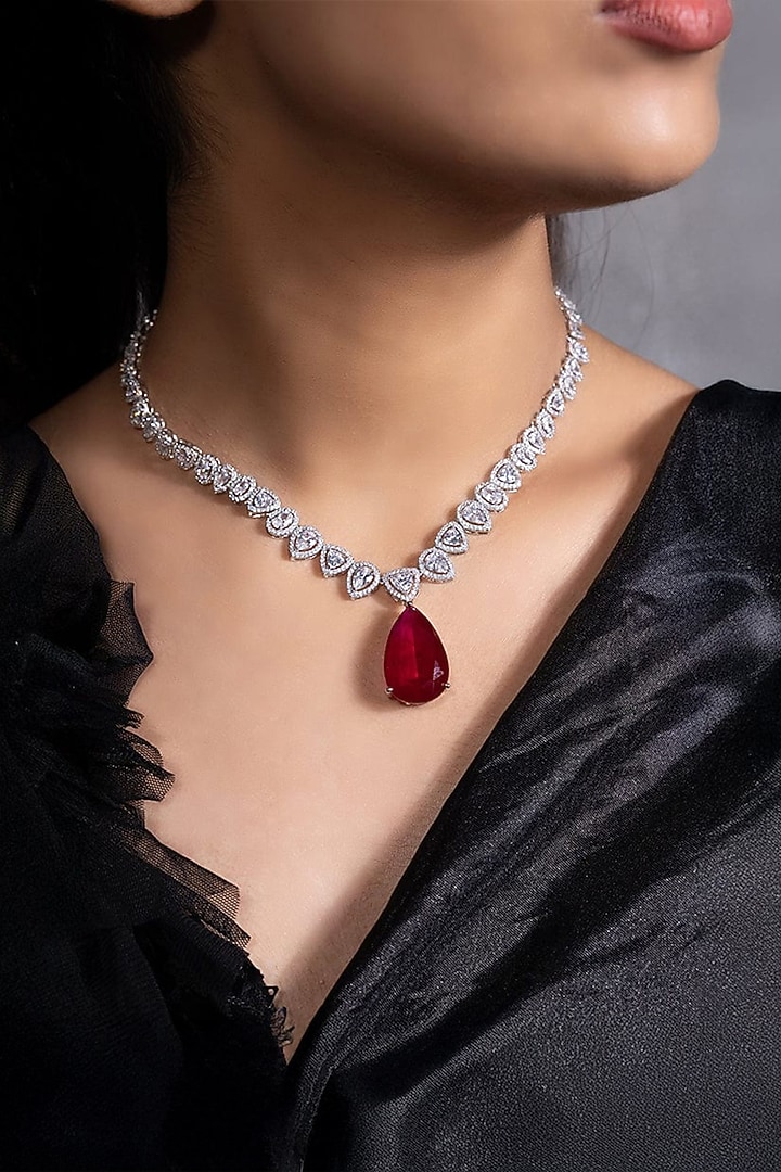 White Finish Crystal & Ruby Pendant Necklace Set by Joules By Radhika at Pernia's Pop Up Shop