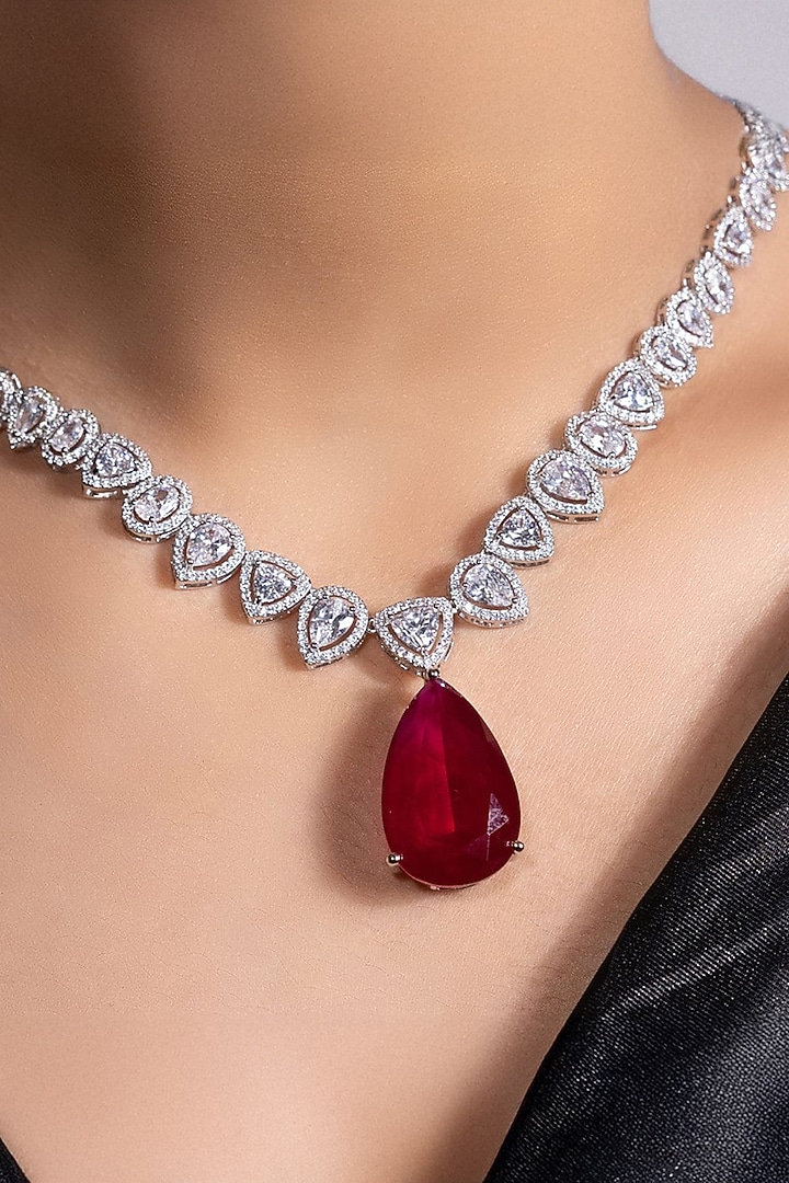 White Finish Crystal & Ruby Pendant Necklace Set by Joules By Radhika at Pernia's Pop Up Shop