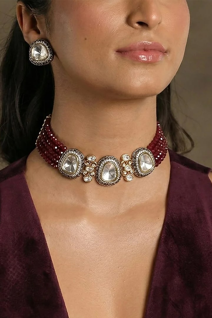 Gold Finish Red Stone Necklace Set by Joules By Radhika at Pernia's Pop Up Shop