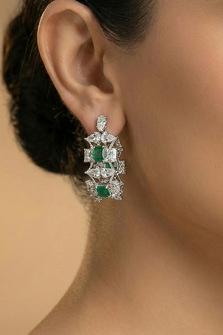 White Finish Zircon & Emerald Stone Dangler Earrings by Joules By Radhika at Pernia's Pop Up Shop
