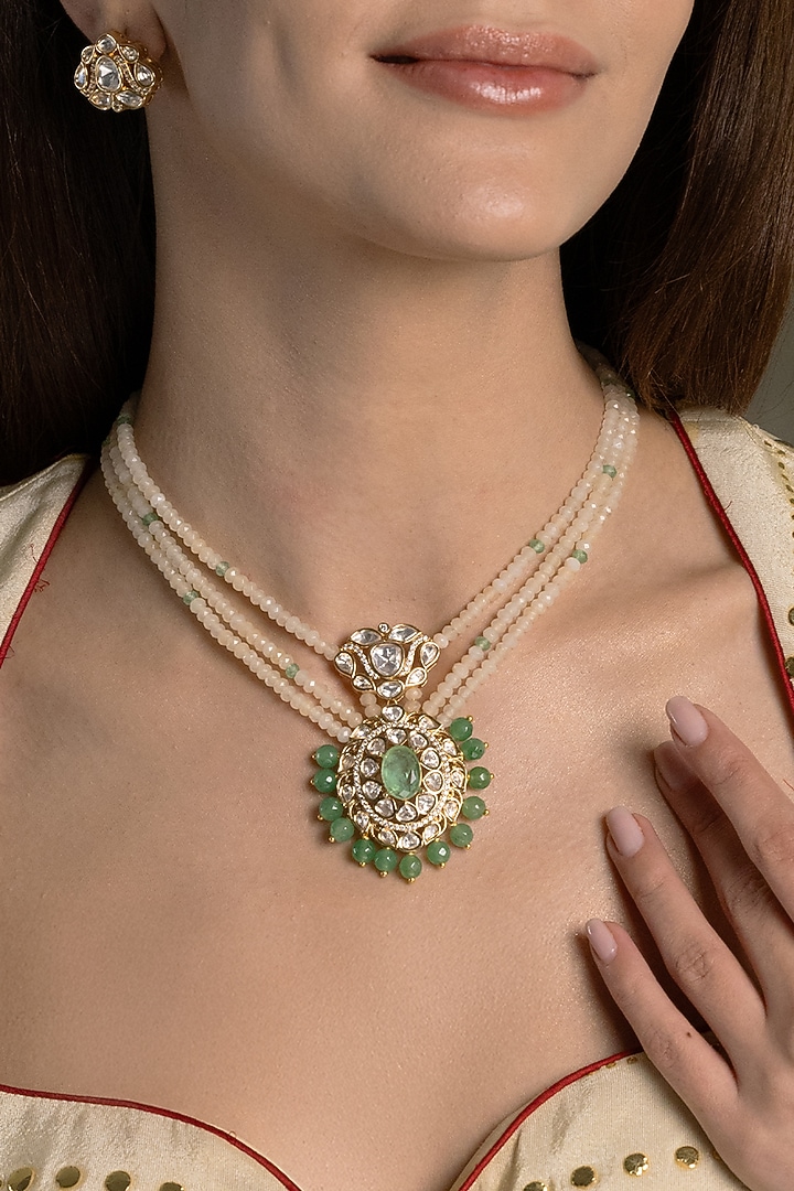 Gold Finish Kundan Polki & White Beaded Long Necklace Set by Joules By Radhika at Pernia's Pop Up Shop