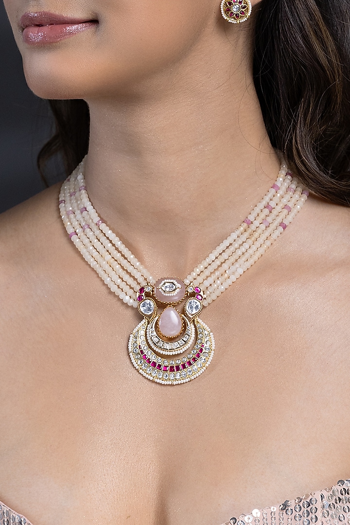 Gold Finish Pink Kundan Polki & White Beaded Long Necklace Set by Joules By Radhika at Pernia's Pop Up Shop