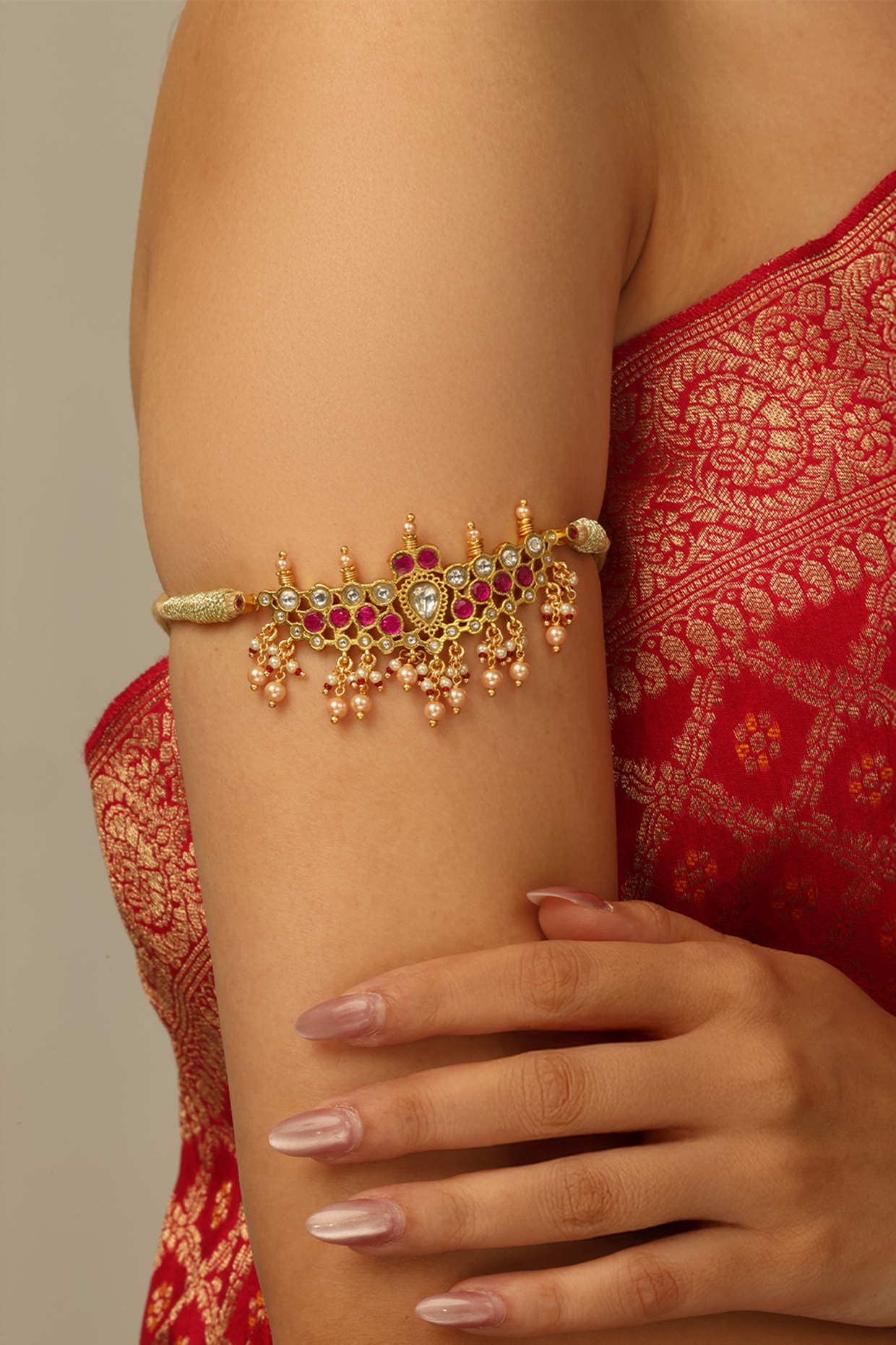 Gold Finish Kundan Polki & Red Stone Aavira Armlet by Joules By Radhika