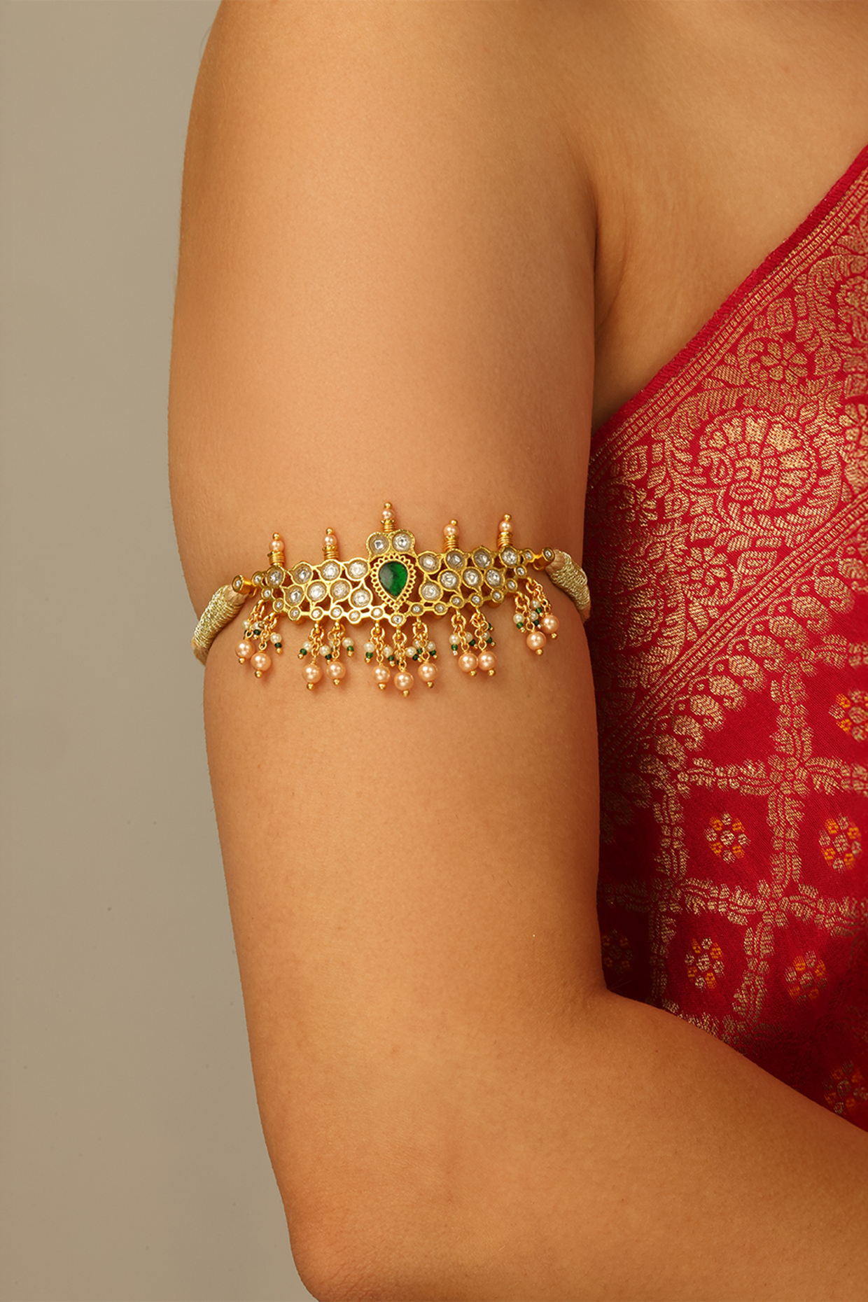 Gold Finish Kundan Polki & Green Stone Zaavya Armlet by Joules By Radhika