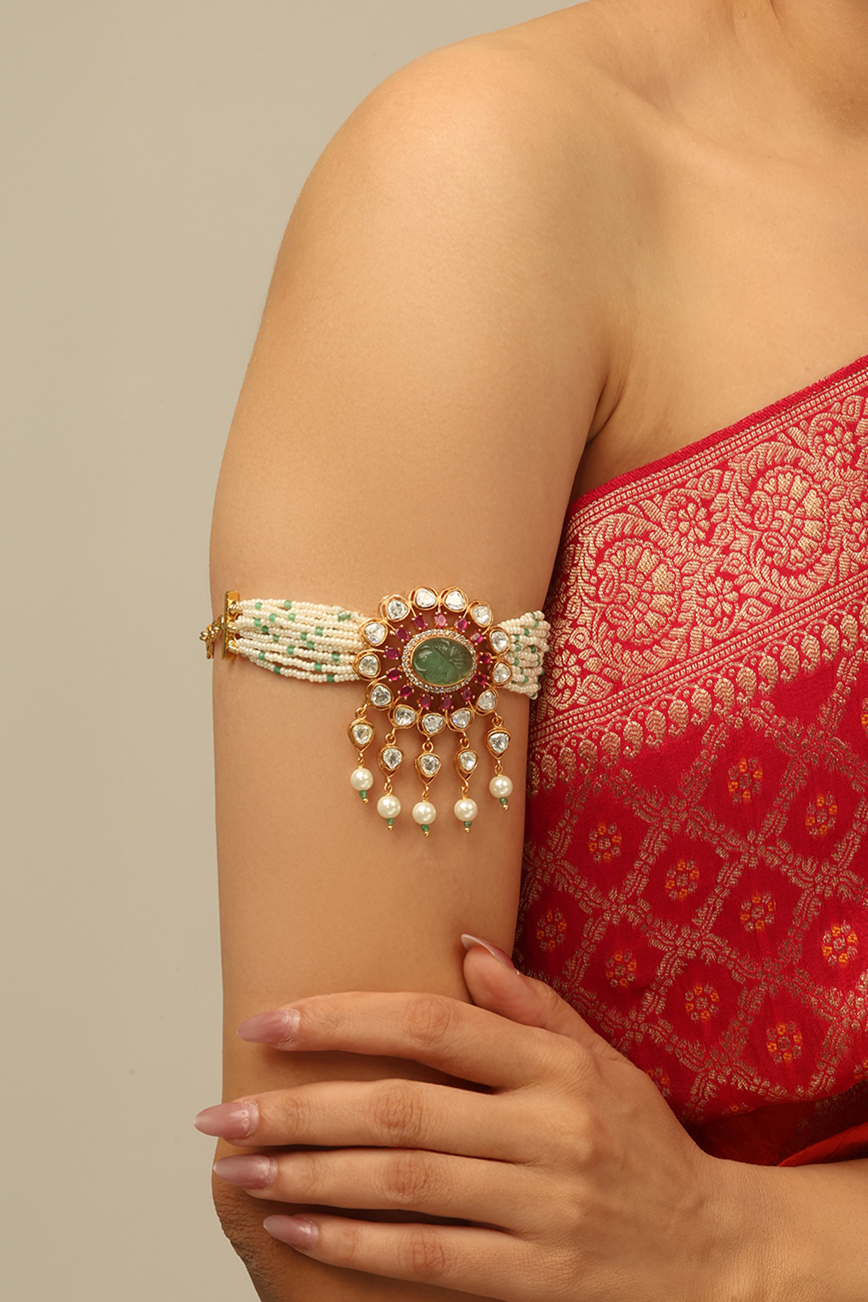 Gold Finish Red Kundan Polki & White Beaded Vihana Armlet by Joules By Radhika