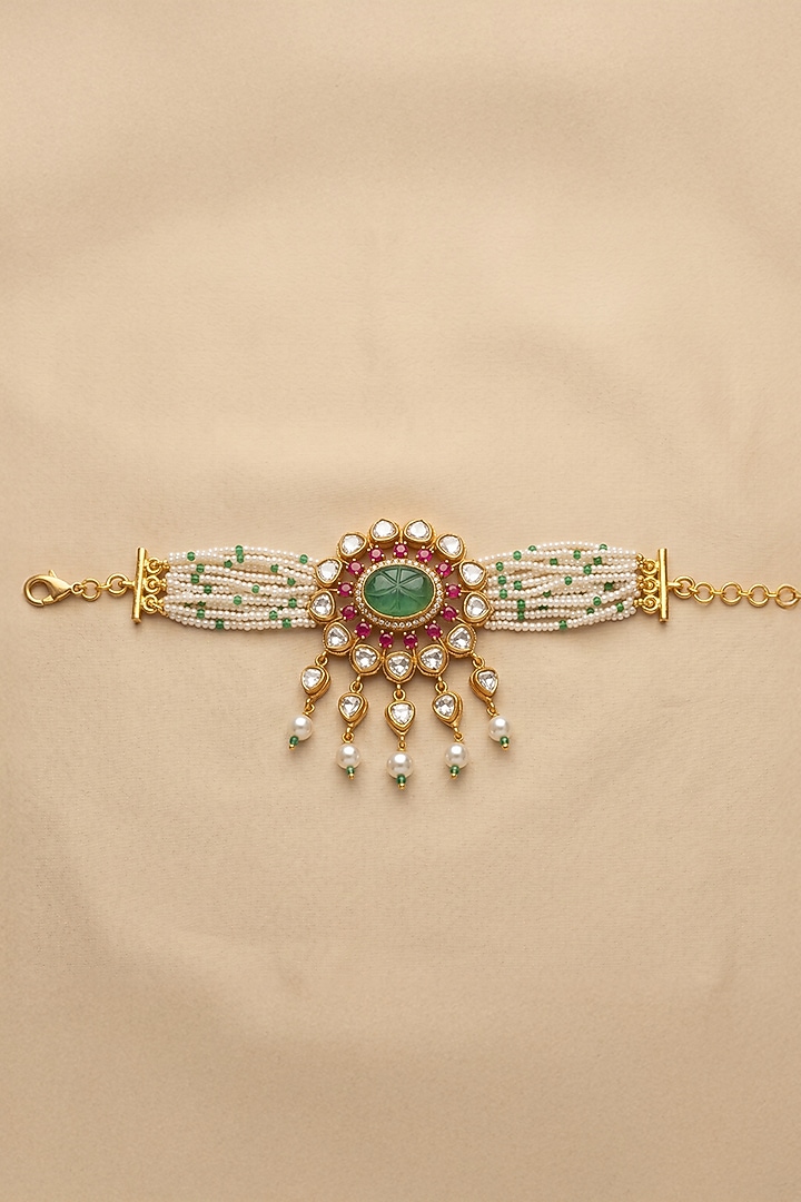 Gold Finish Red Kundan Polki & White Beaded Vihana Armlet by Joules By Radhika at Pernia's Pop Up Shop