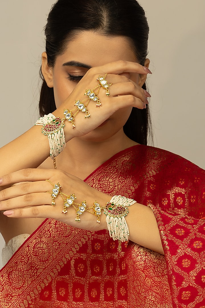 Gold Finish Kundan Polki & White Beaded Zavira Haathphool by Joules By Radhika at Pernia's Pop Up Shop