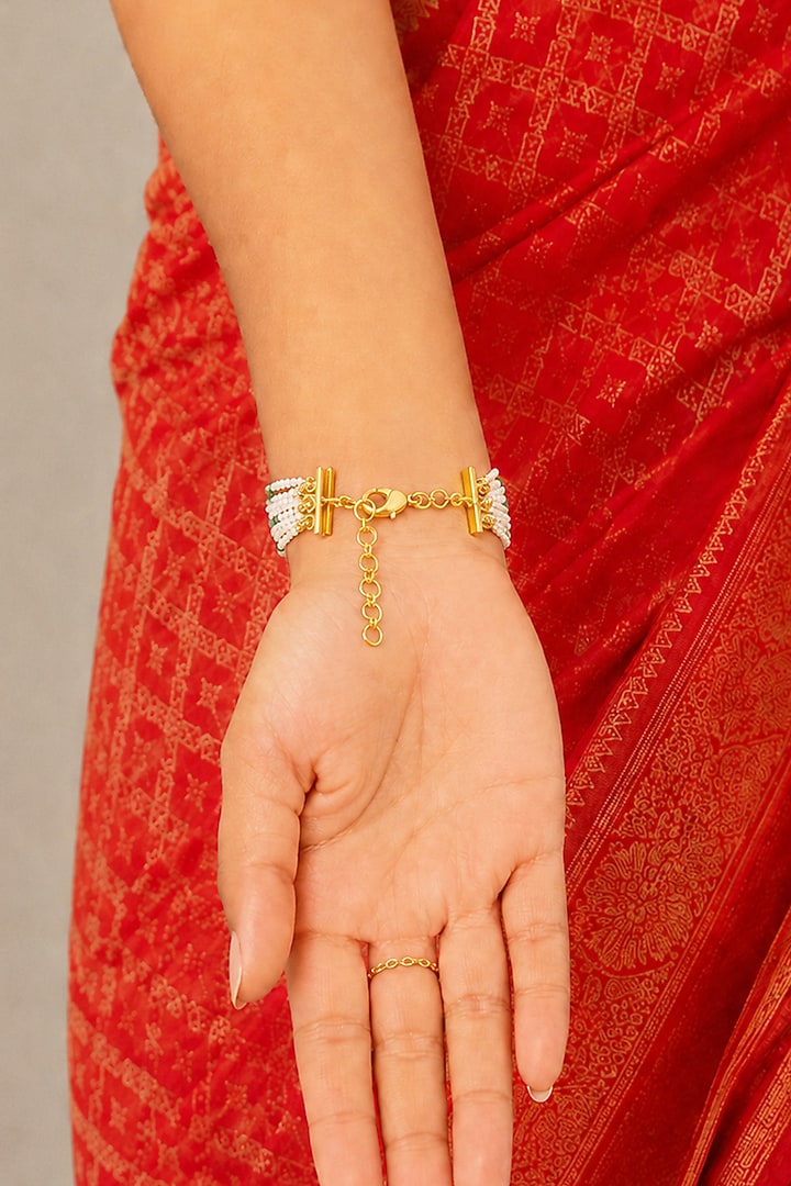 Gold Finish Kundan Polki & White Beaded Zavira Haathphool by Joules By Radhika at Pernia's Pop Up Shop