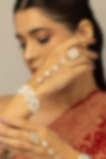 Gold Finish Kundan Polki & White Beaded Navya Haathphool by Joules By Radhika at Pernia's Pop Up Shop