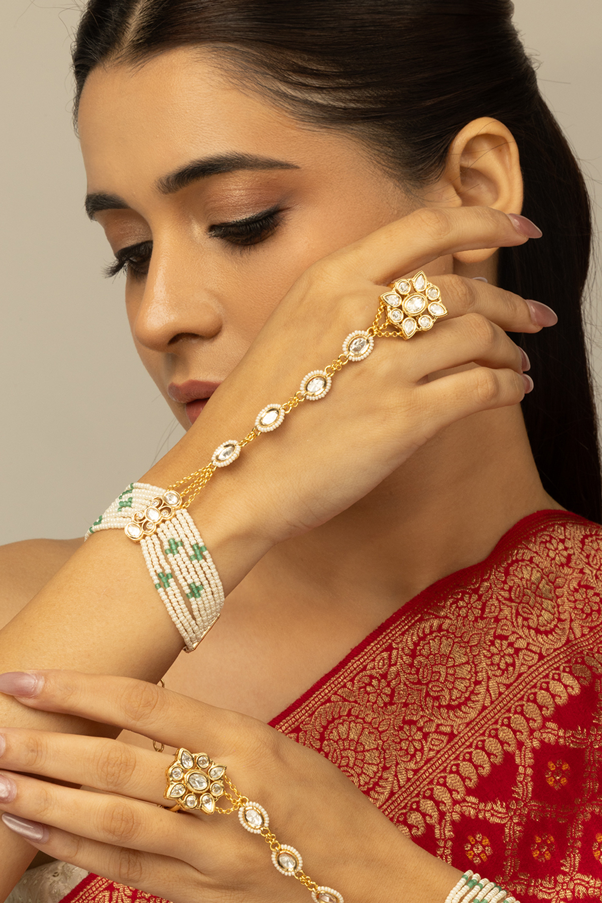 Gold Finish Kundan Polki & White Beaded Navya Haathphool by Joules By Radhika