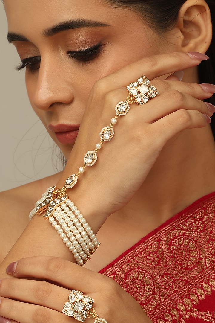Gold Finish Kundan Polki & Pearl Riyana Haathphool by Joules By Radhika at Pernia's Pop Up Shop