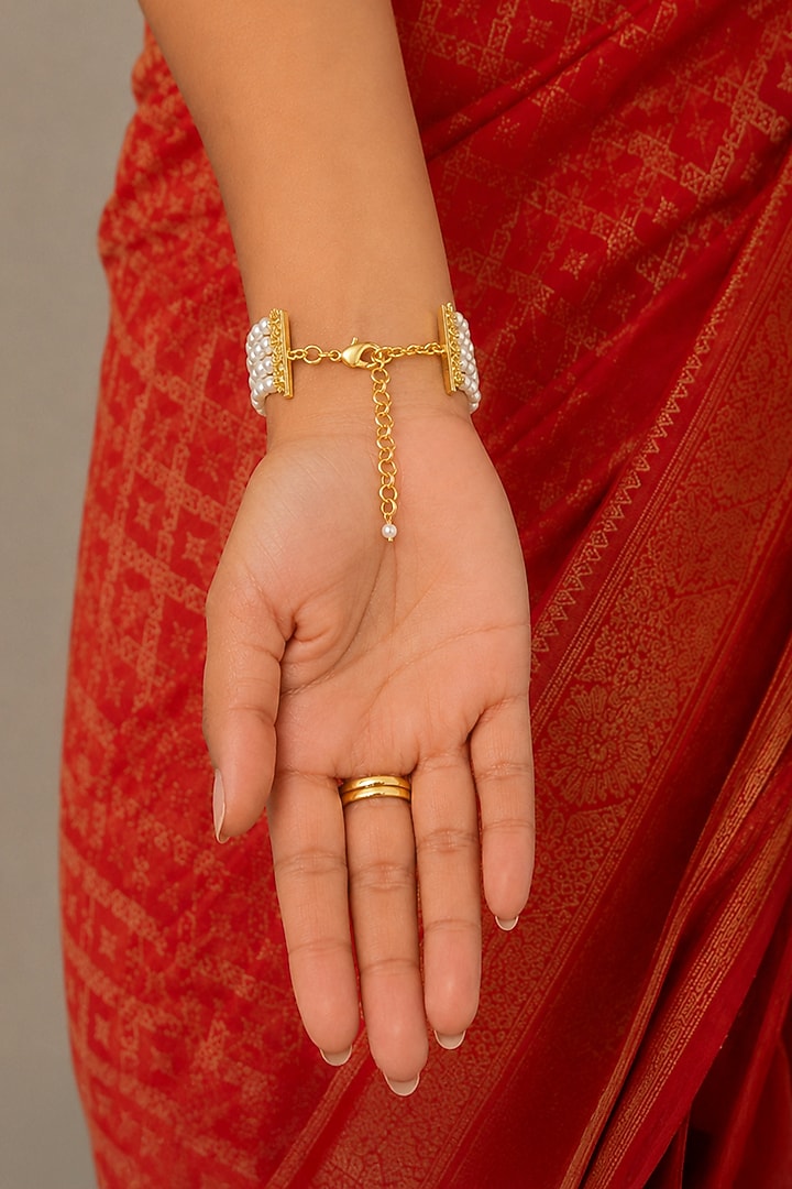 Gold Finish Kundan Polki & Pearl Riyana Haathphool by Joules By Radhika at Pernia's Pop Up Shop