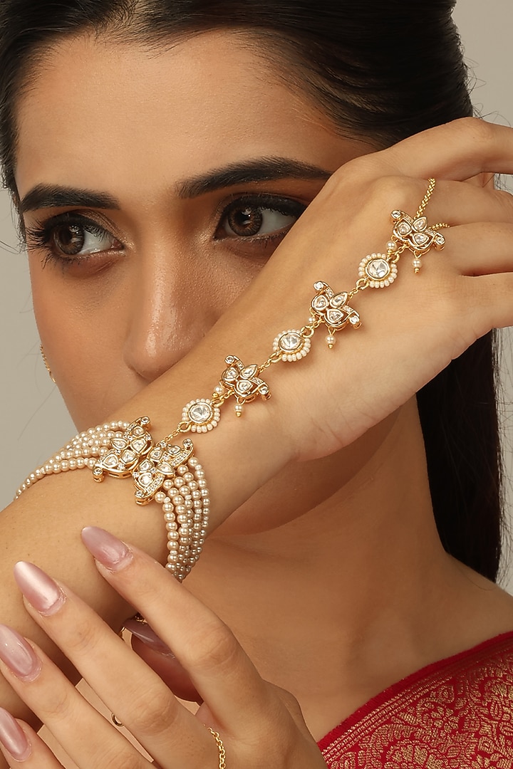 Gold Finish Kundan Polki & Pearl Lavya Haathphool by Joules By Radhika at Pernia's Pop Up Shop