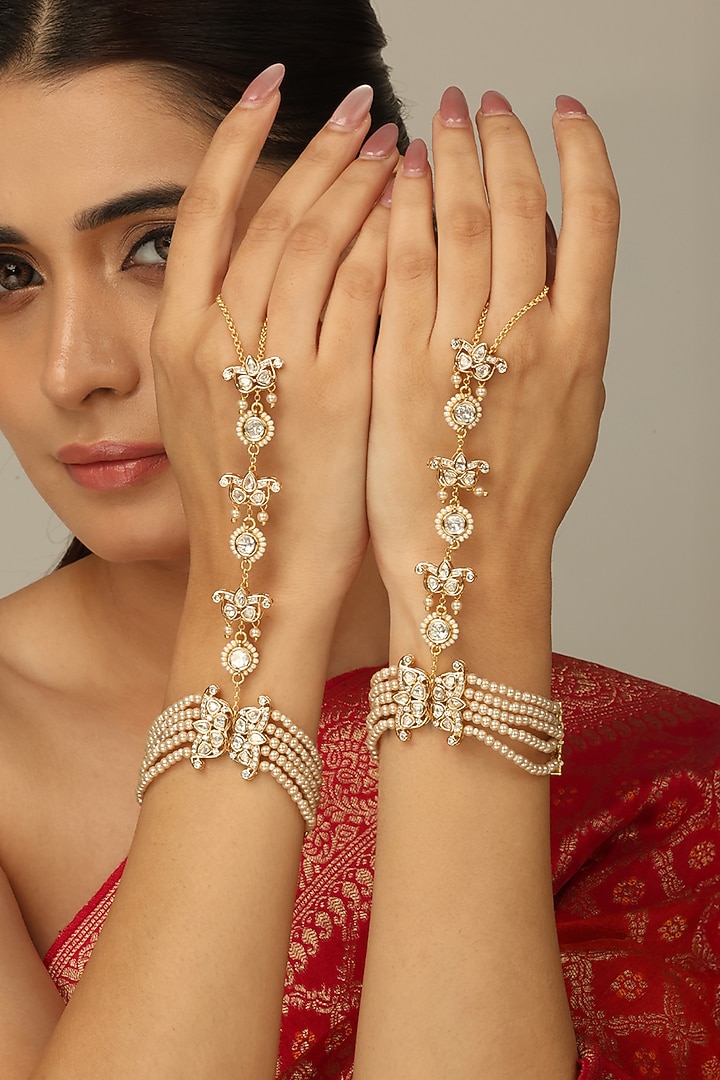 Gold Finish Kundan Polki & Pearl Lavya Haathphool by Joules By Radhika at Pernia's Pop Up Shop