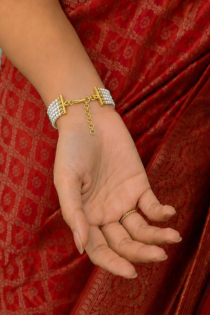 Gold Finish Kundan Polki & Pearl Lavya Haathphool by Joules By Radhika at Pernia's Pop Up Shop