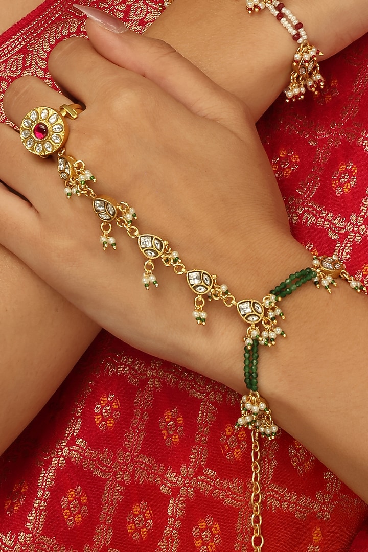 Gold Finish Kundan Polki & White Beaded Ruhani Haathphool by Joules By Radhika at Pernia's Pop Up Shop