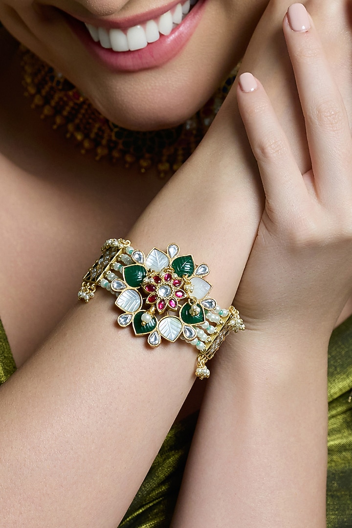 Yellow Gold Finish Ruby & Emerald Stone Floral Bracelet by Joules By Radhika at Pernia's Pop Up Shop