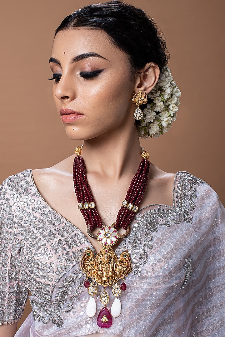 Gold Finish Temple Necklace Set With Red Agate Beads by Joules By Radhika at Pernia's Pop Up Shop